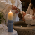 Modern christening candle displayed for a baby baptism ceremony with personalized name, date and blessing design