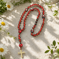 Handmade ladybug Catholic rosary with natural stone beads and crucifix, designed as a meaningful prayer gift for women and girls