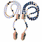 Catholic wedding rosary set featuring matching blue and clear prayer beads, gold-tone crucifixes, and Marian centerpieces for a sacred marriage ceremony.