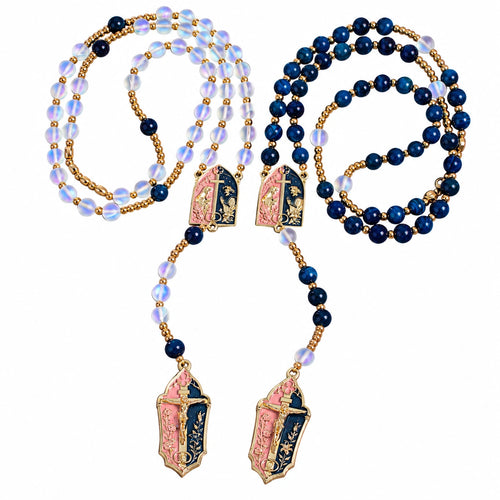 Catholic wedding rosary set featuring matching blue and clear prayer beads, gold-tone crucifixes, and Marian centerpieces for a sacred marriage ceremony.