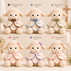 Additional product image of the personalized baptism lamb plush wearing its white ceremonial outfit.