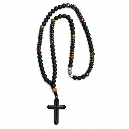 Handmade men’s black Catholic rosary with matte black beads, tiger-eye accents, dark metal details, and black crucifix.