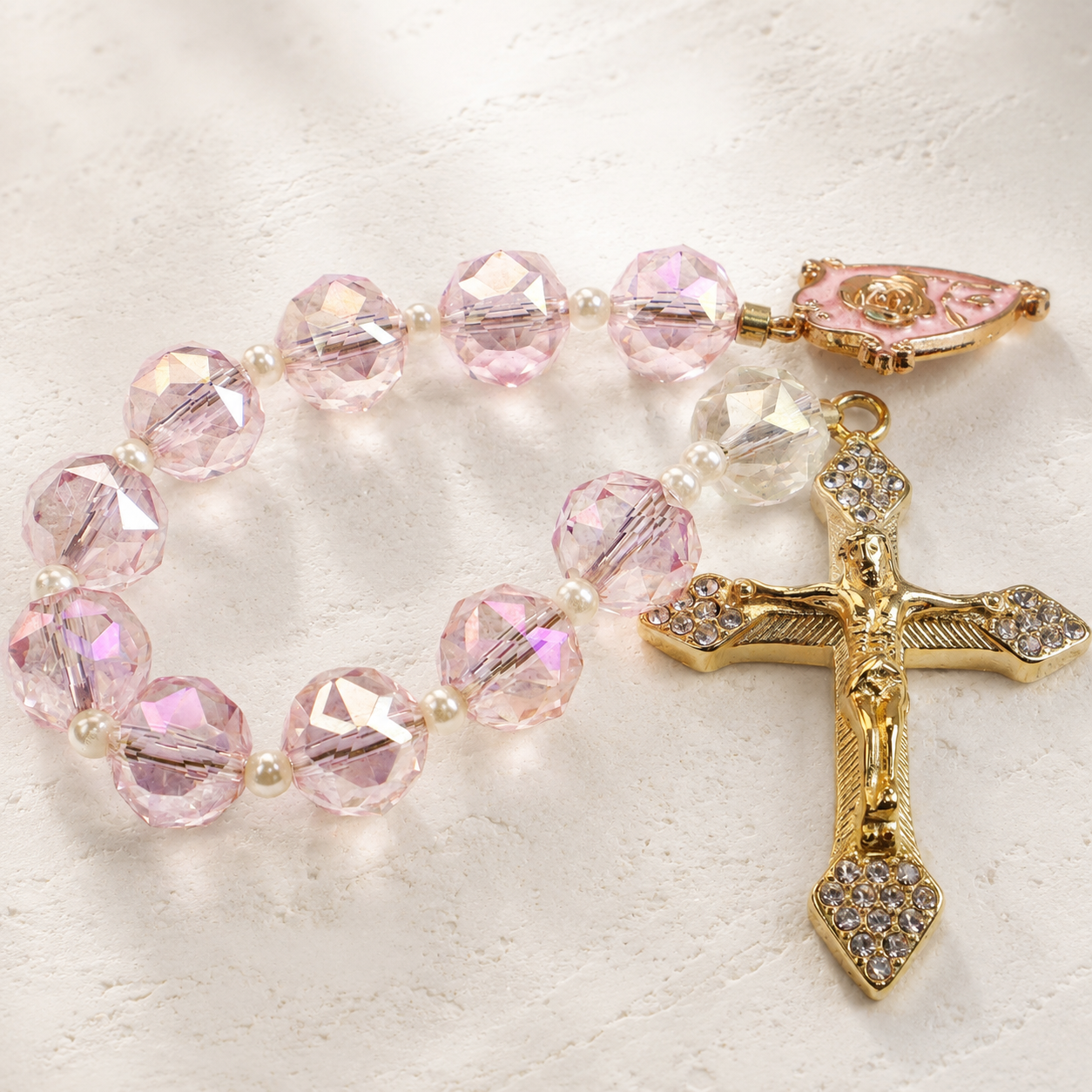 Handmade crystal Catholic prayer beads with sparkling beads, cross pendant, and religious charm for daily prayer and reflection.