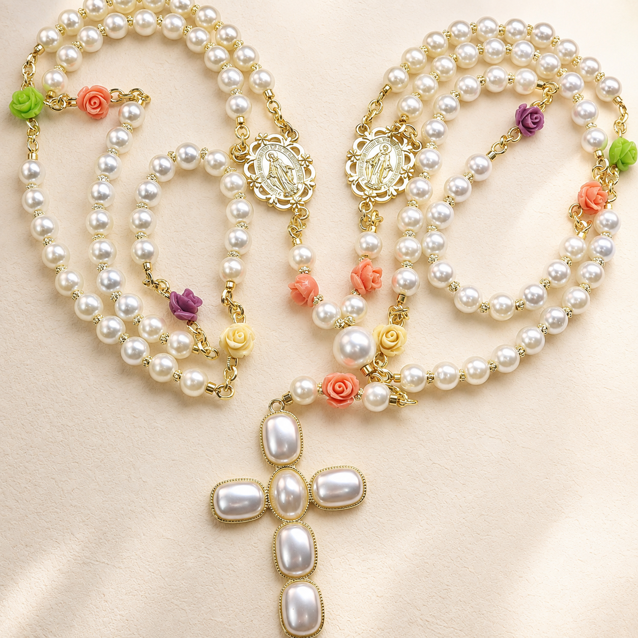 Handmade pearl Catholic wedding rosary with floral accents, gold Marian medals, and large pearl cross pendant for bridal lasso ceremony.