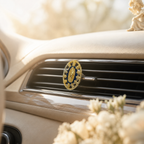 Green Virgin Mary car vent clip attached to vehicle air conditioner vent, Catholic faith car accessory