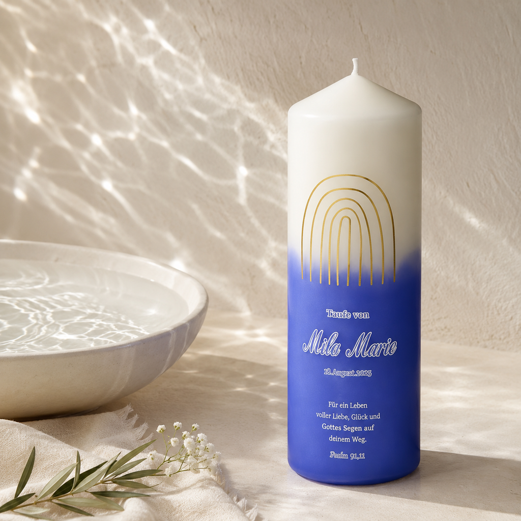 Personalized blue baptism candle with rainbow design, custom name and date for a baby's christening ceremony