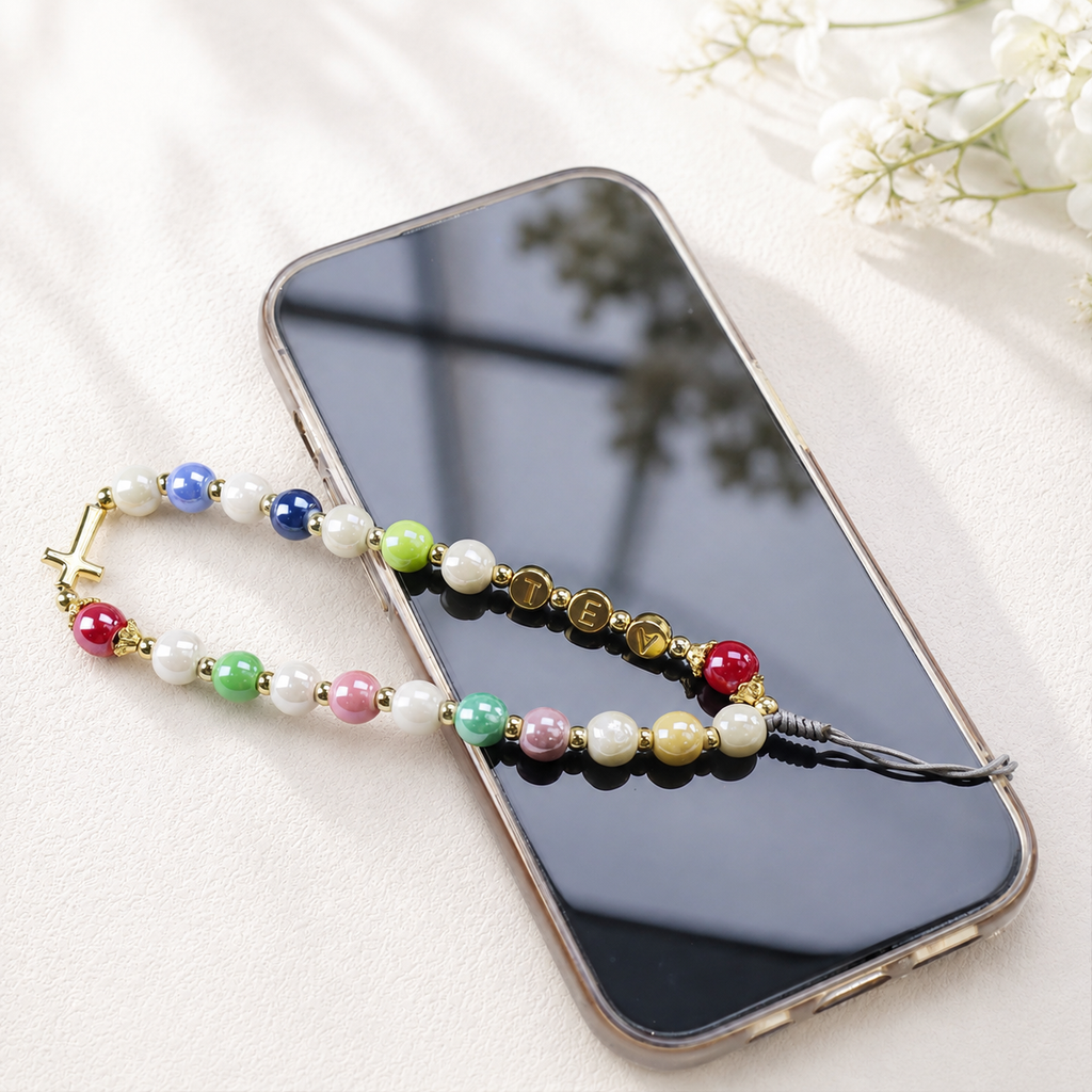 Pastel crystal Catholic charm with cross pendant, versatile phone strap and bag accessory for daily inspiration