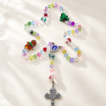 Colorful Catholic kids rosary with vibrant glass beads, handmade religious details, and a crucifix centerpiece designed for children's prayer and faith gifts.