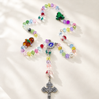Colorful Catholic kids rosary with vibrant glass beads, handmade religious details, and a crucifix centerpiece designed for children's prayer and faith gifts.