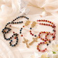 Handmade Catholic couple wedding rosary set with gemstone-style beads, Marian centerpieces, personalized letter charms, and gold crucifix pendants.