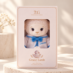 Personalized baptism lamb keepsake with a soft ivory plush body and a white outfit made for a child's faith milestone.