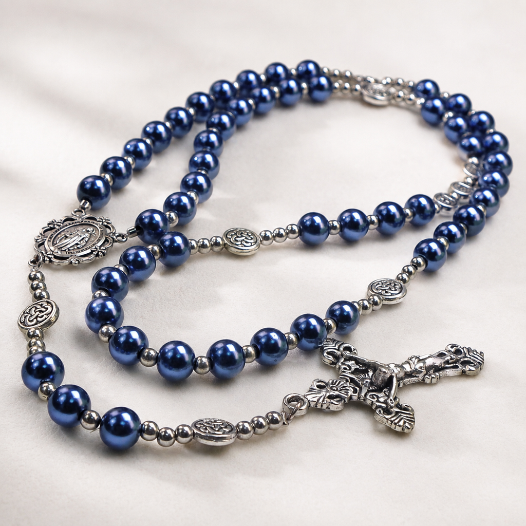 Blue pearl Catholic rosary with silver crucifix and religious medals, handmade prayer beads designed for daily prayer and spiritual reflection.