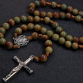 Men's earth tone Catholic rosary with natural stone beads, silver crucifix, and traditional handmade design for daily prayer.