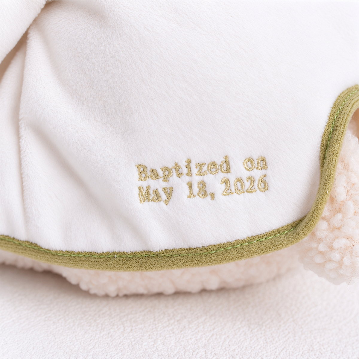Personalized religious baby gift: a soft ivory lamb dressed in a white baptism outfit with embroidered details.