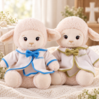 Personalized baptism plush lamb with custom name embroidery, soft cape outfit, bow detail, and gentle faith-inspired design.