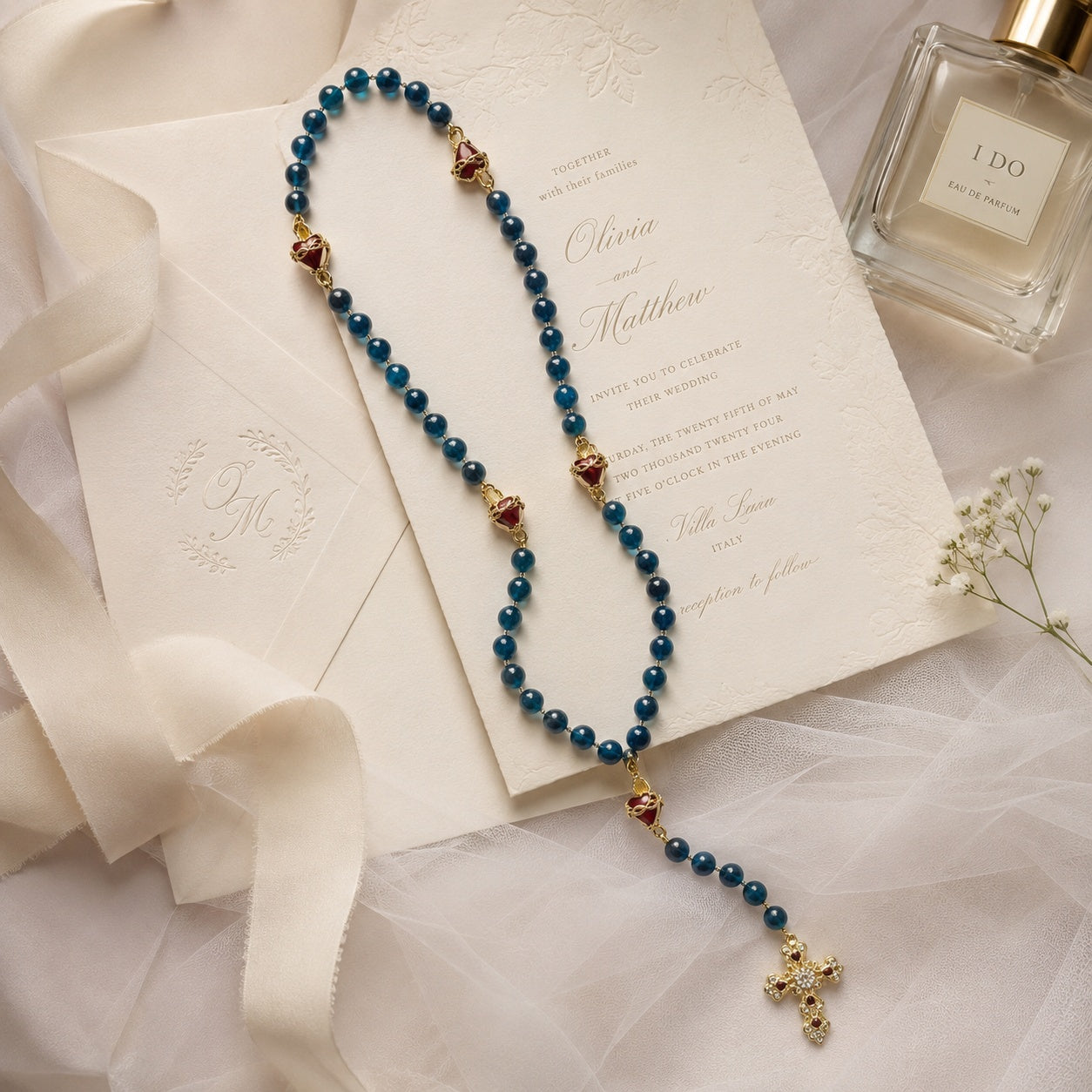 Catholic wedding rosary draped over a church pew with white ribbon and baby’s breath, perfect for bridal bouquet decor, marriage blessing, and religious wedding photography.