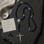 Something Blue Catholic wedding rosary with deep blue beads and silver crucifix, styled as groom and bride prayer beads for a meaningful marriage keepsake.