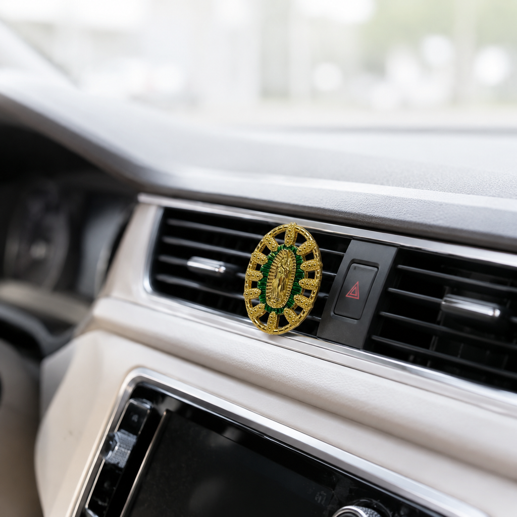Catholic Virgin Mary car vent clip displayed on a luxury white car interior with green religious charm details