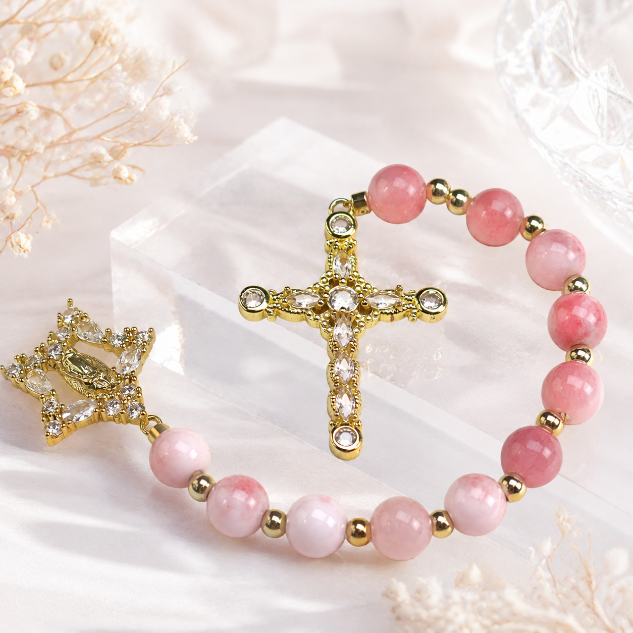 Pink Catholic pocket rosary with gemstone beads, gold-tone crucifix, and Marian charm designed for daily prayer and meaningful faith gifts.