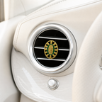 Green Virgin Mary car air vent clip with gold religious charm design for Catholic faith inspired vehicle decoration