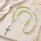 Elegant green Catholic prayer beads with silver crucifix and Marian center medal for First Communion, baptism, or daily devotion