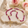 Pink gemstone Catholic rosary beads handmade for women, traditional prayer beads with elegant crucifix and devotional design