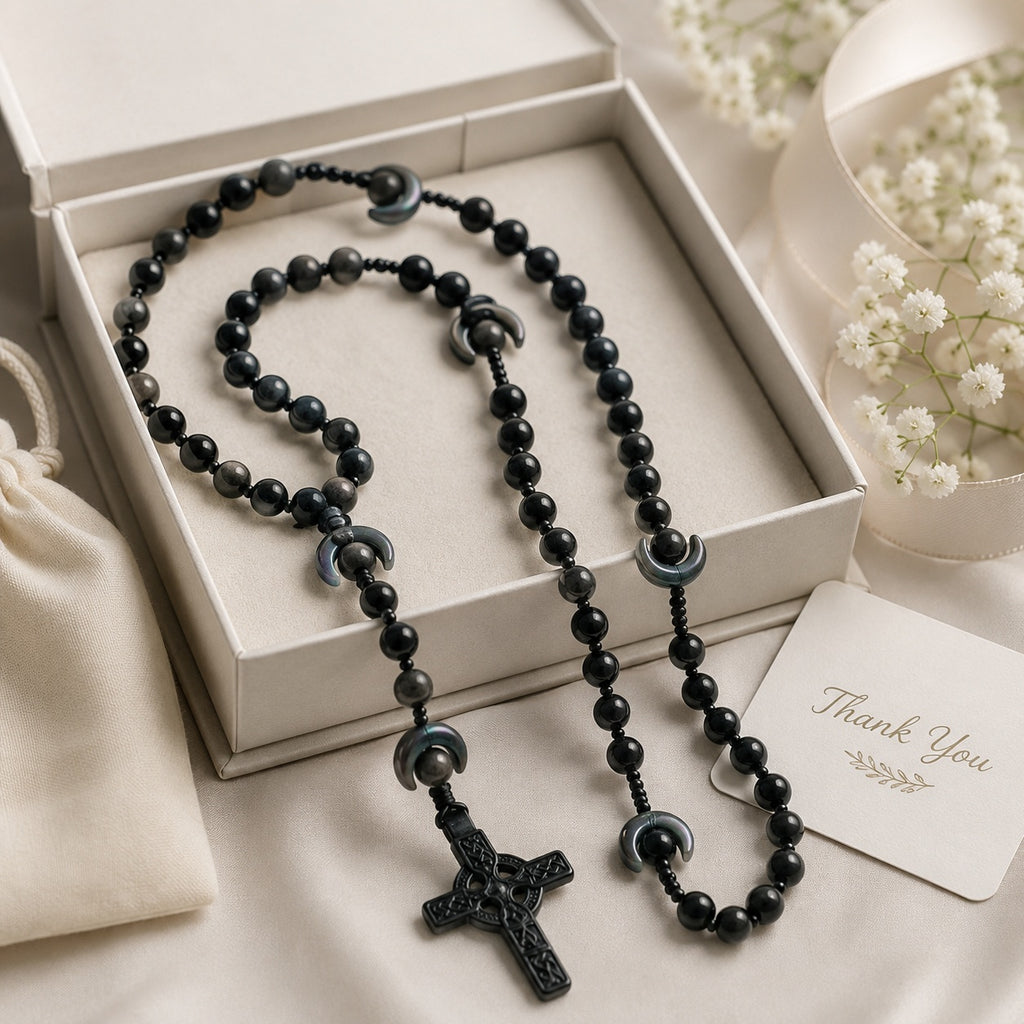 Handmade black stone rosary for Catholic men, arranged on a dark wooden tray with a black crucifix for prayer, wedding, or spiritual keepsake use.
