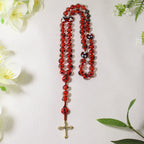 Catholic ladybug rosary displayed in a peaceful prayer setting, symbolizing faith, blessing, and daily devotion