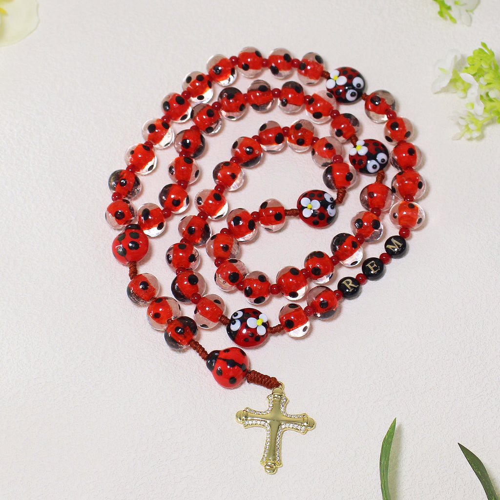 Personalized ladybug Catholic rosary with letter beads and handmade details, a unique faith gift for girls and women