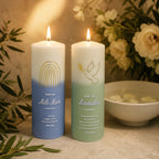 Pastel baptism candle gift set with personalized Taufe text, Christian symbols, baptism card, white lace baby outfit, ribbon, and floral details for a meaningful christening keepsake.