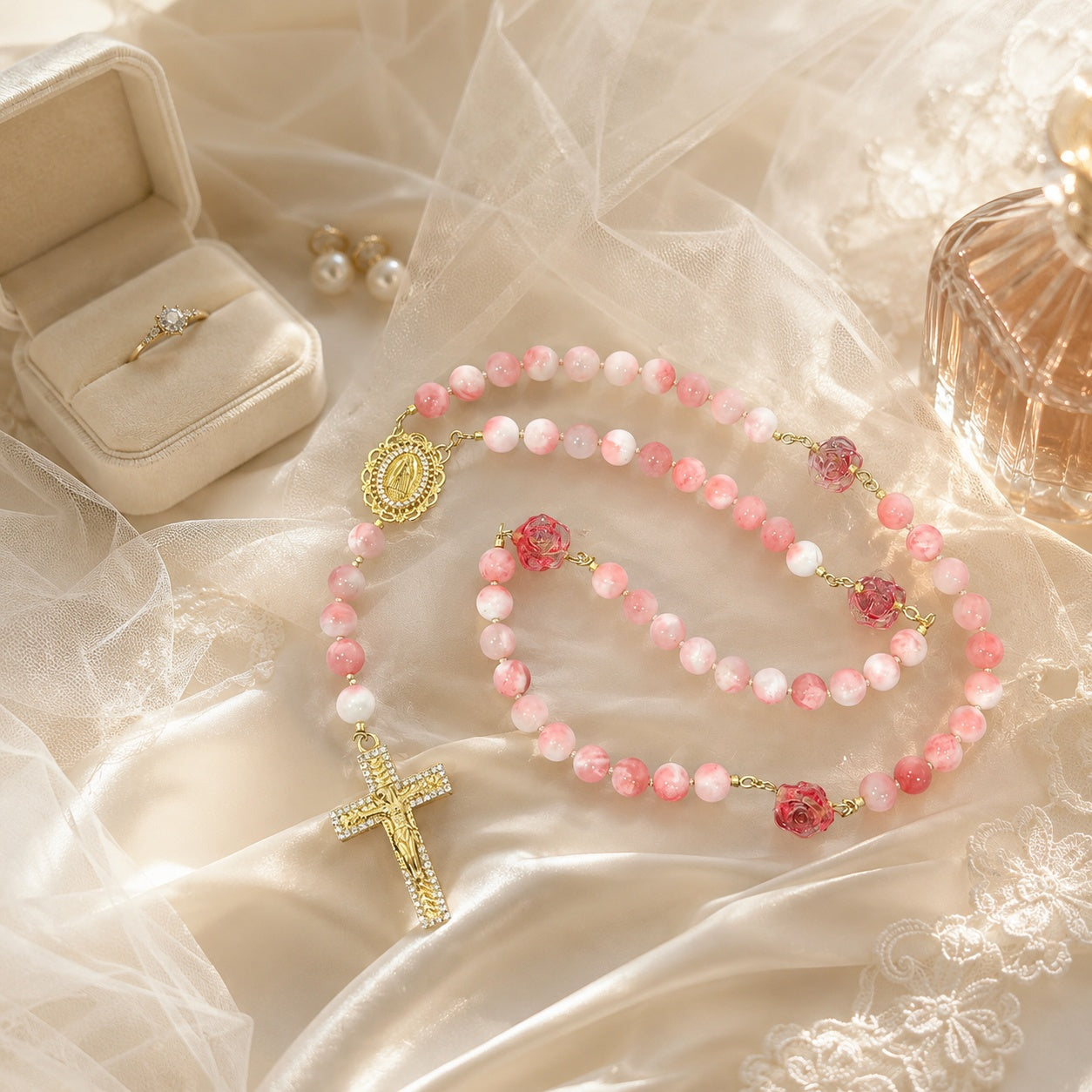 Romantic pink wedding rosary for bride with rose beads, gold details, and crucifix, symbolizing faith, love, and marriage blessing