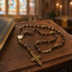 Catholic gift for him featuring a masculine brown rosary with natural stone-style beads, gold religious details, and a traditional crucifix.