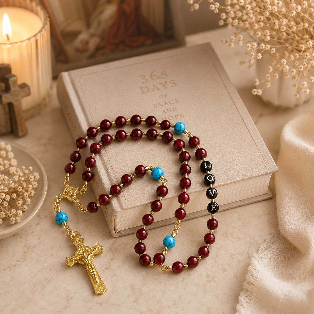 Elegant red rosary gift featuring a gold crucifix, turquoise beads, and devotional LOVE detail for baptism or confirmation