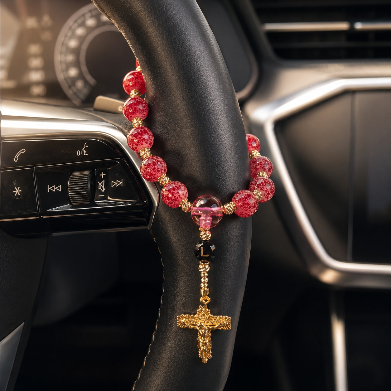 Personalized red steering wheel rosary with gold-tone details, black initial bead, and crucifix for a meaningful Catholic driver gift