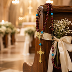 Elegant red bridal rosary hanging on a church pew with gold crucifix and LOVE beads, designed as a Catholic wedding keepsake